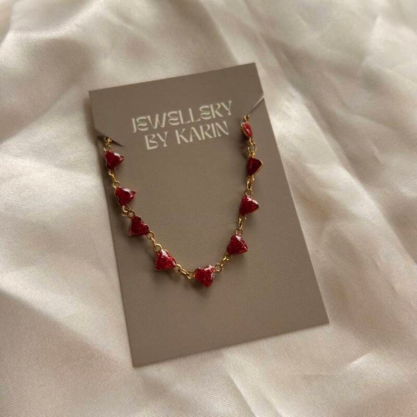 bracelet chained hearts red gold