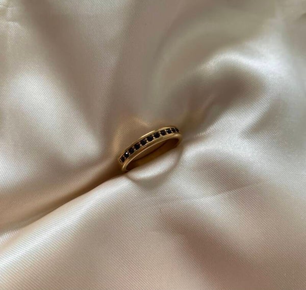 ring row of diamonds purple gold