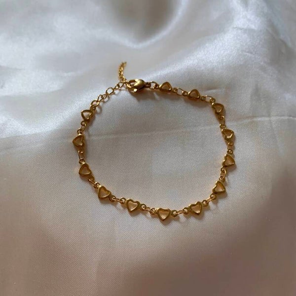 bracelet chained open hearts gold