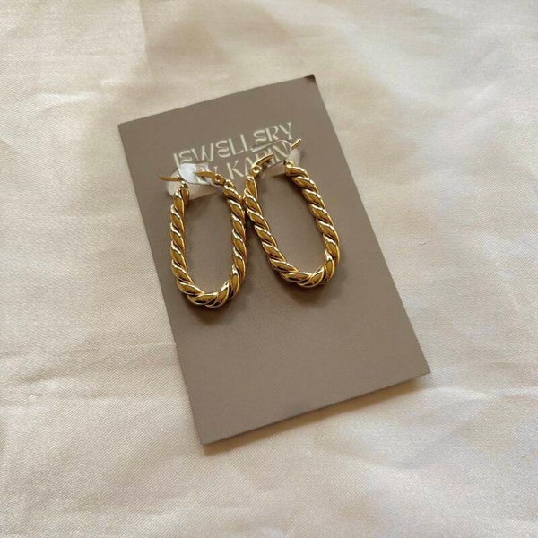 earrings gold oval hoops texture