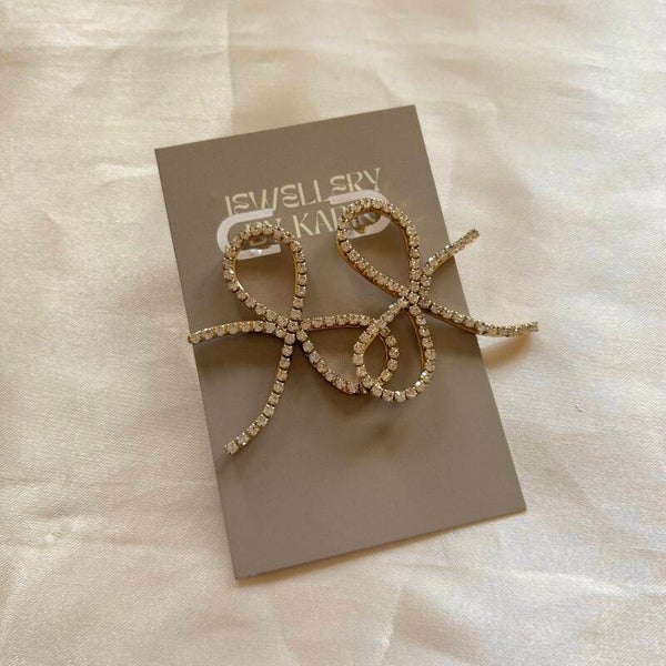 earrings bows diamonds