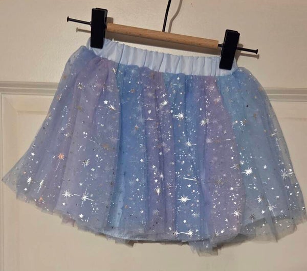 Blauwe tutu met zilveren sterren