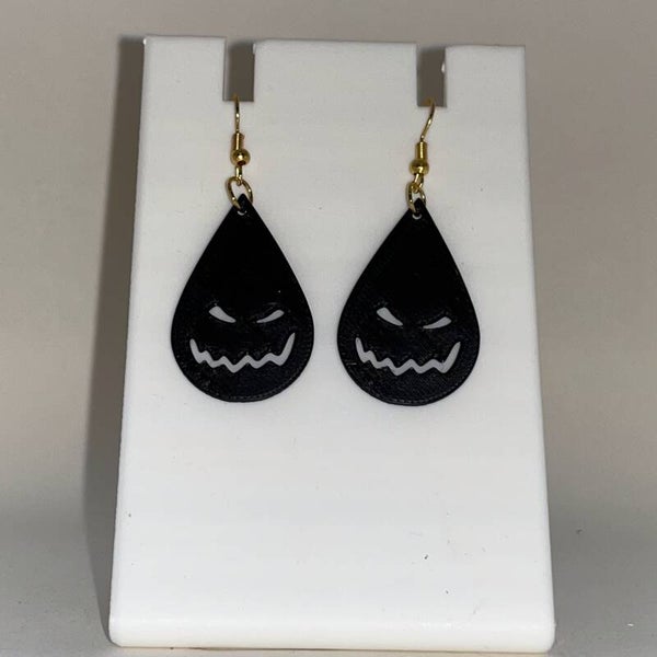 Pompoen gezicht oorbel