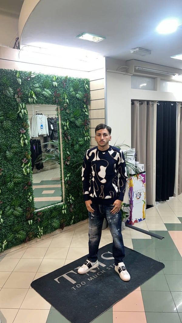 Maglione con fantasie blu