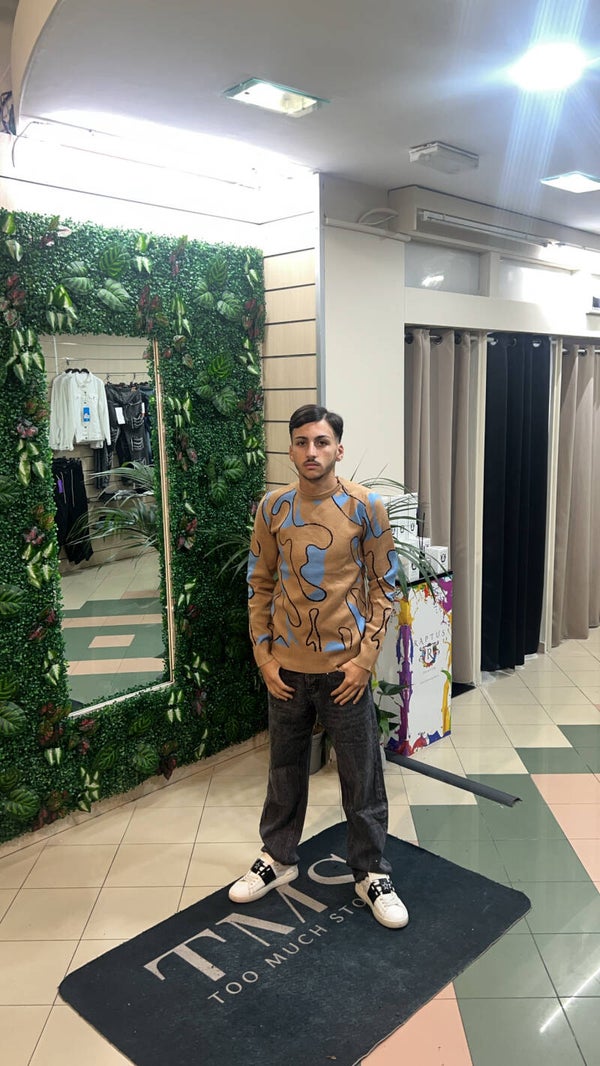 Maglione con fantasia beige