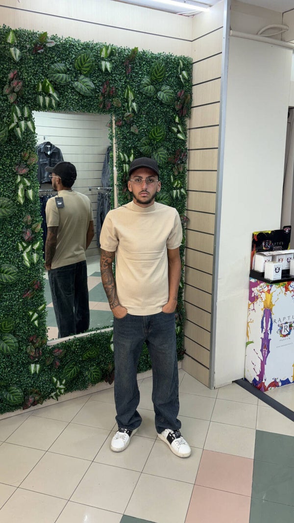 Maglia in filo a collo alto crema