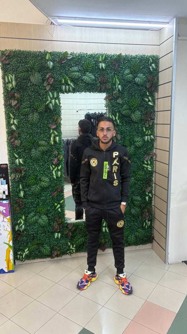 TUTA PARIS NERA CON LOGO ORO