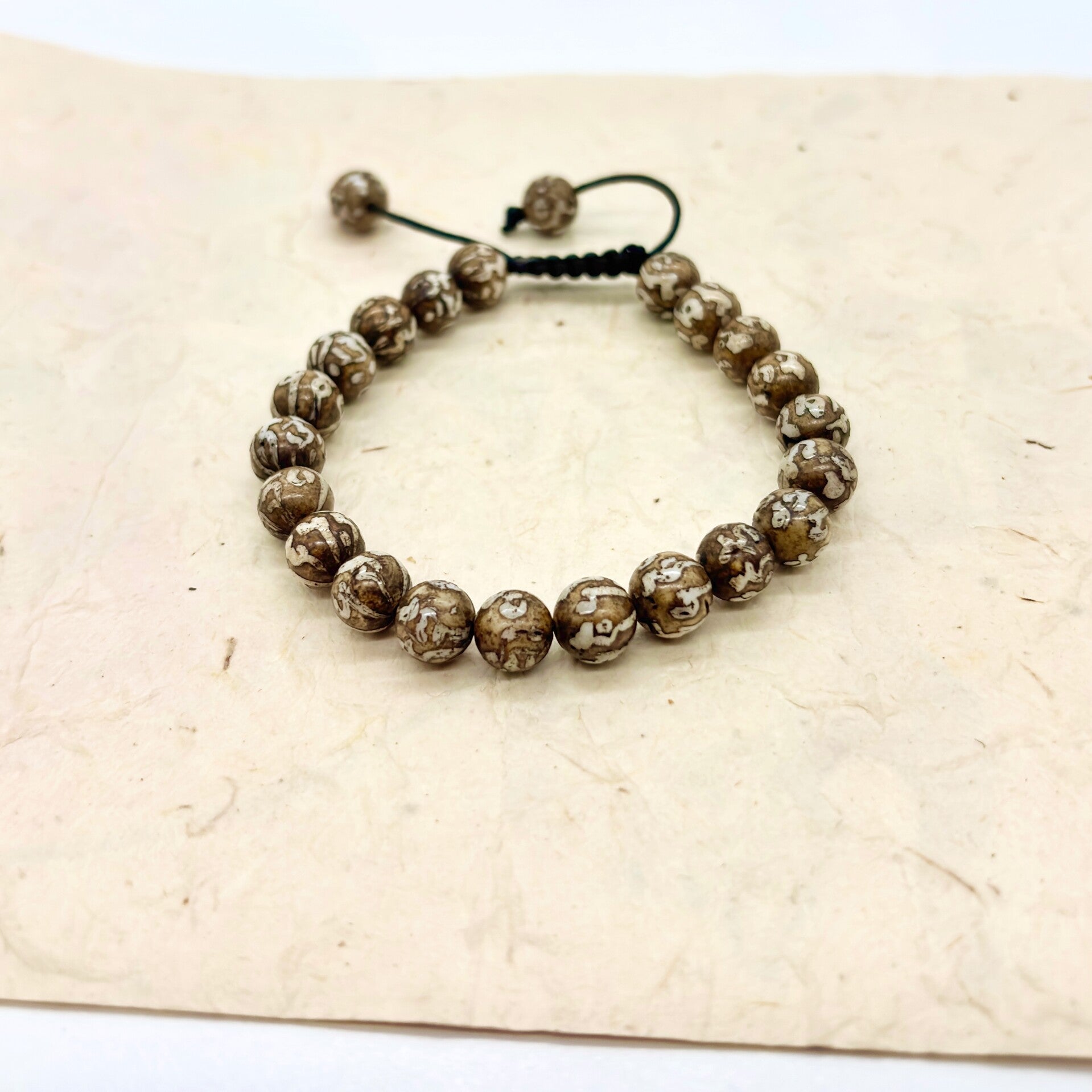 Om Schelp Armbanden