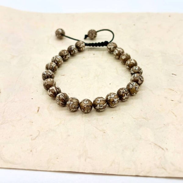 Om Schelp Armbanden