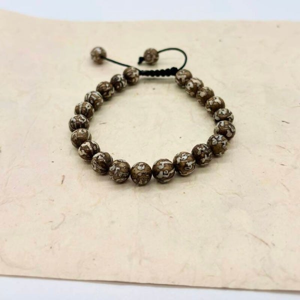 Om Schelp Armbanden