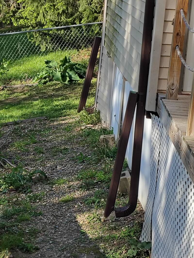 Hinged extensions for easy mowing