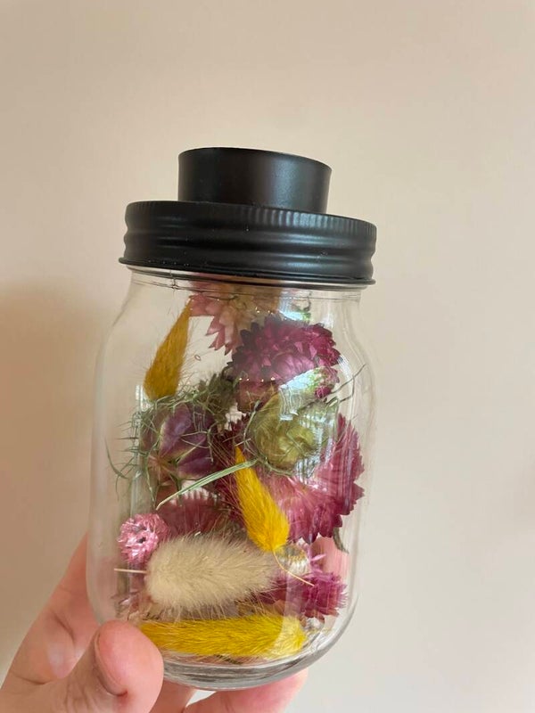 Gevuld glas voor waxinelichtje