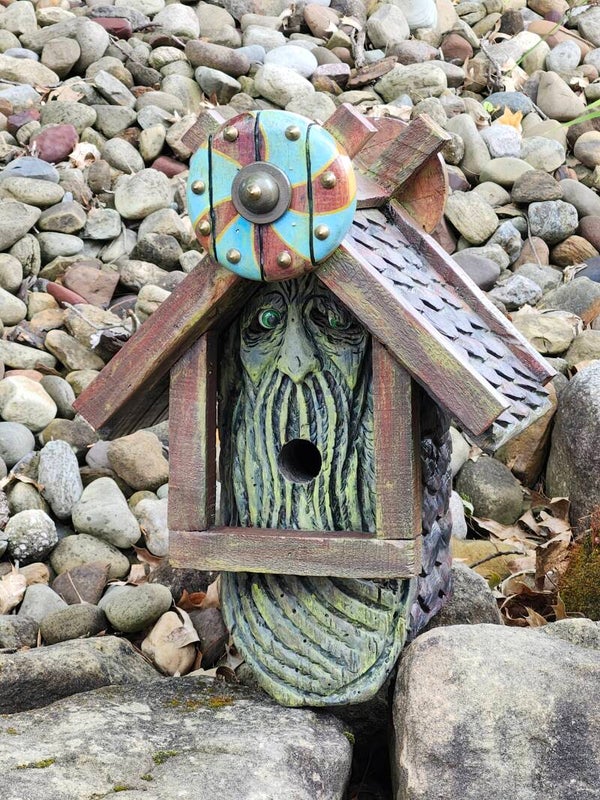 Hand carved wood spirit bird houses