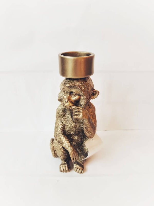 Gouden kaarshouder aapje