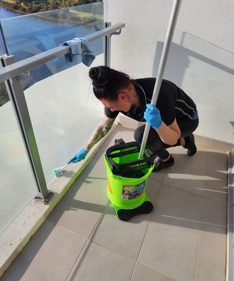 Balcony Cleaning in Progress