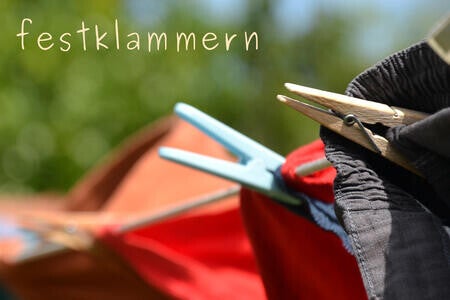 festklammern