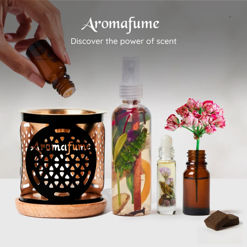 aromafume essentiele olie en brandertje voor een theelichtje met de afbeelding van een levensbloem