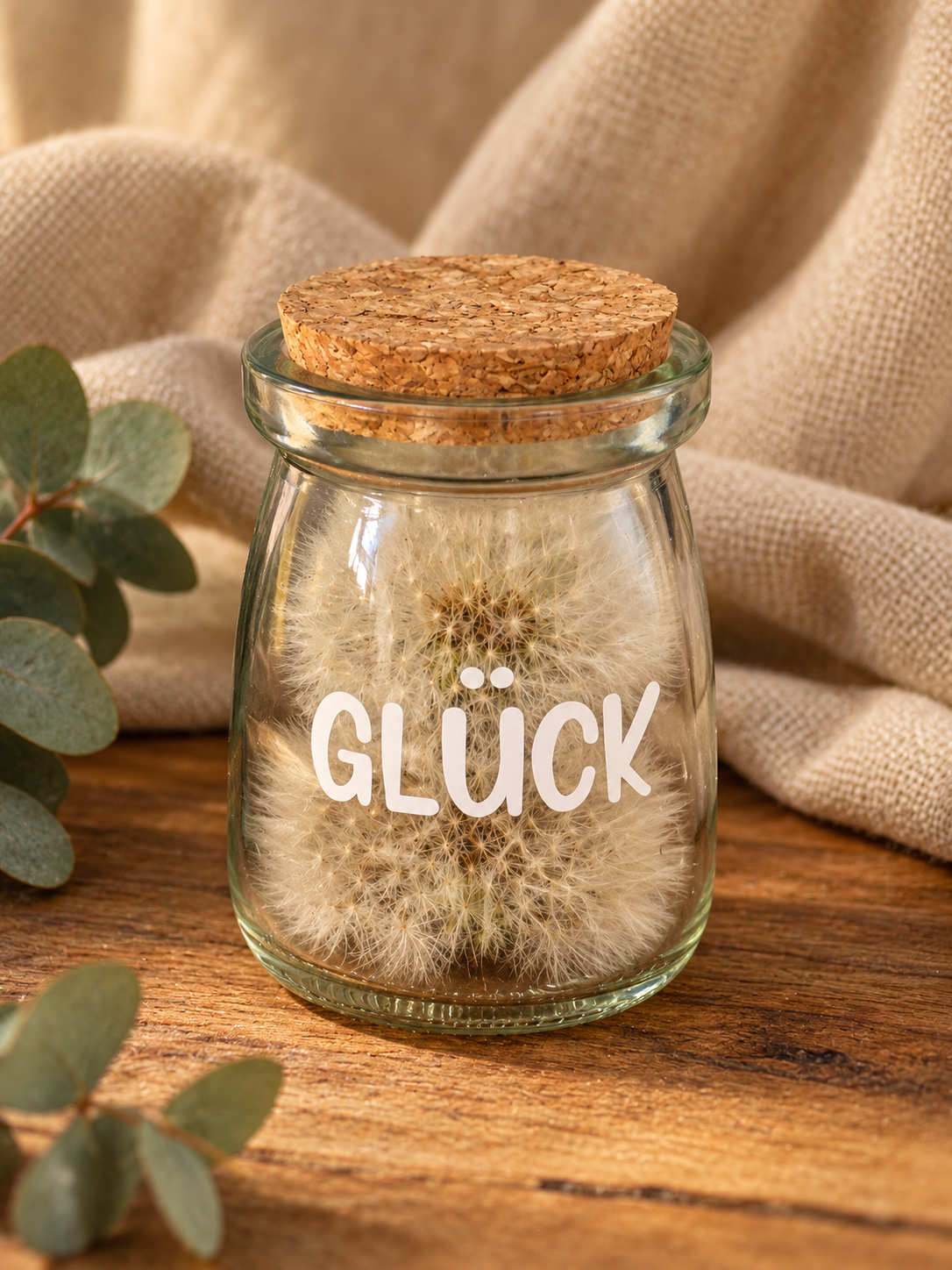 Reagenzglas mit Pustenblumen