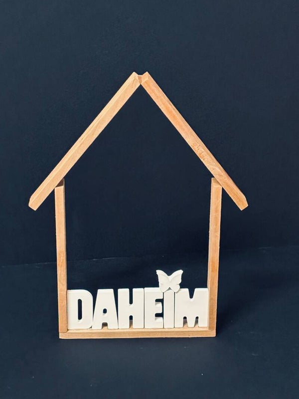 Klötzchenhaus mit Schriftzug