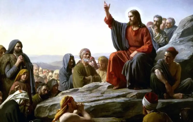 Jésus enseignant les béatitudes lors du Sermon sur la montagne devant une foule de disciples