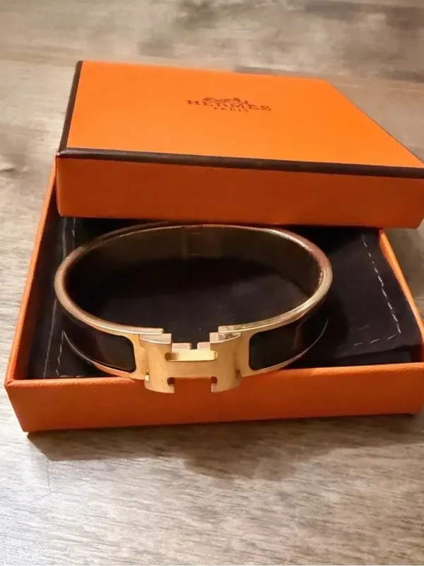 Hermès Clic H Bracelet PM – Black Enamel with Gold-Tone Hardware | Classic Luxury Designer Bangle