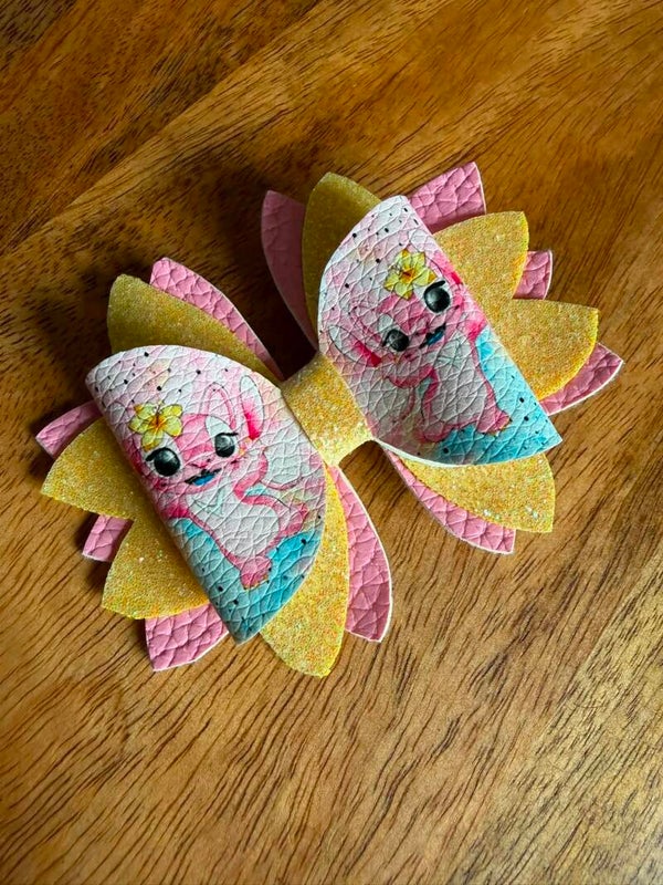 Haarstrik angel roze geel