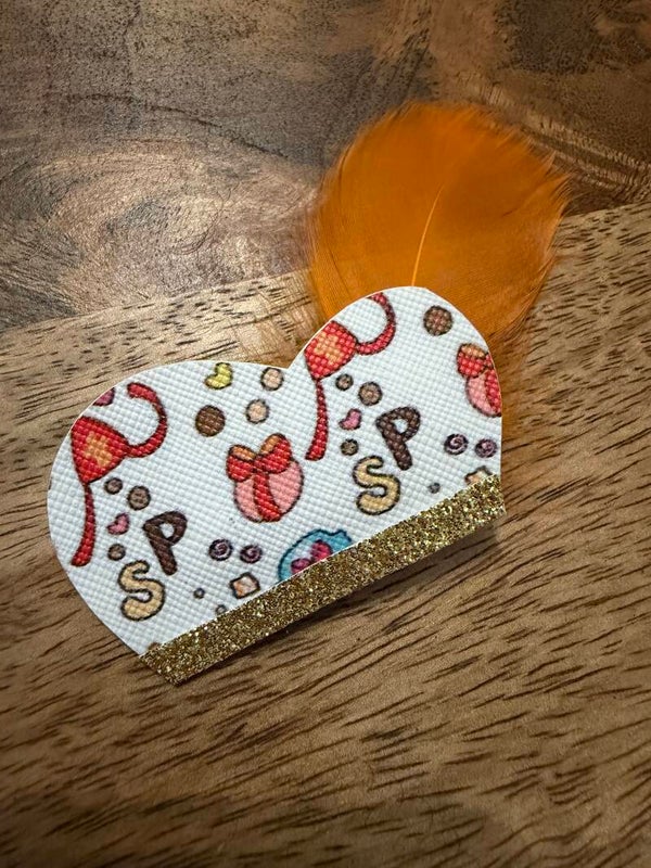 Pieten muts goud oranje veer