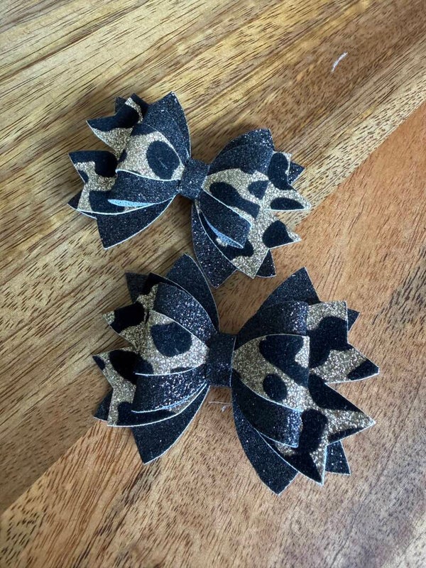Luxe haarstrik goud zwart