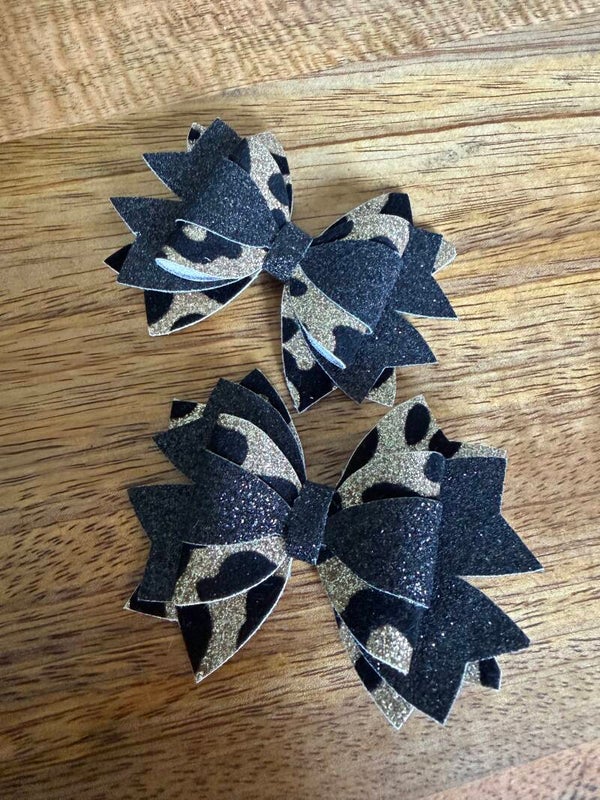 Luxe haarstrik zwart goud panter