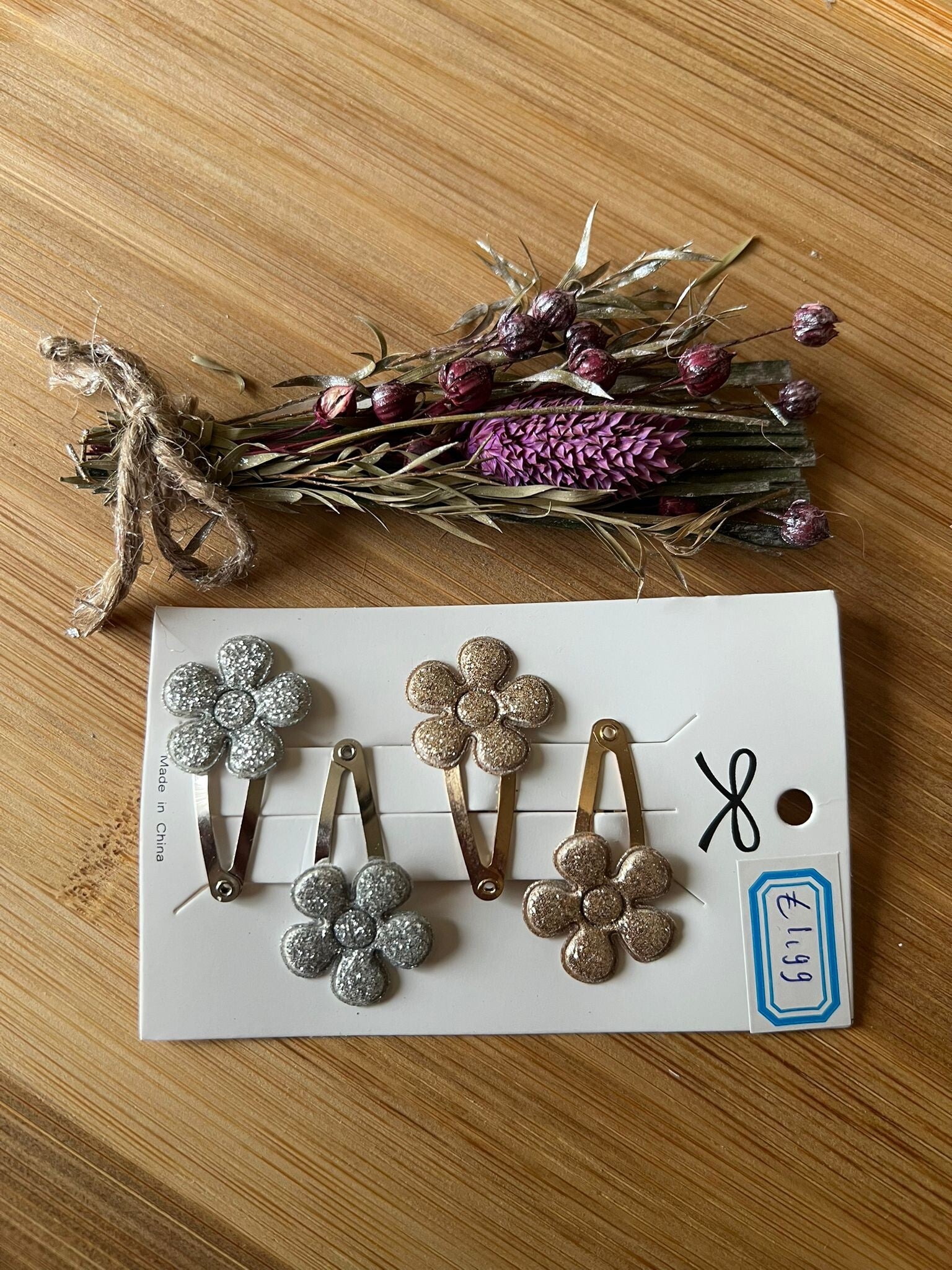 Haarknipjes goud zilver bloem