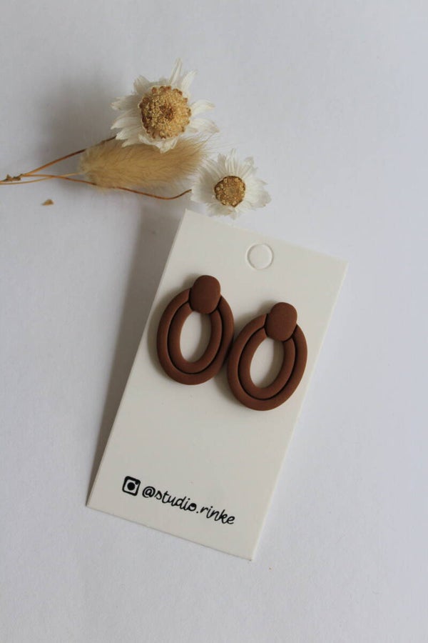 Brown Engraved Ellipse