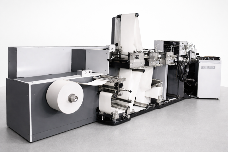 Flexographic ticket printing press prints admit-1 and parking ticket processing unit.png