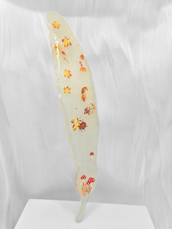 plume d'automne coccinelle