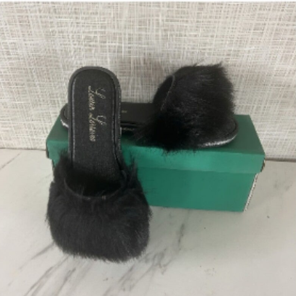 Lauren Lorraine 'Fluffy' Black slides