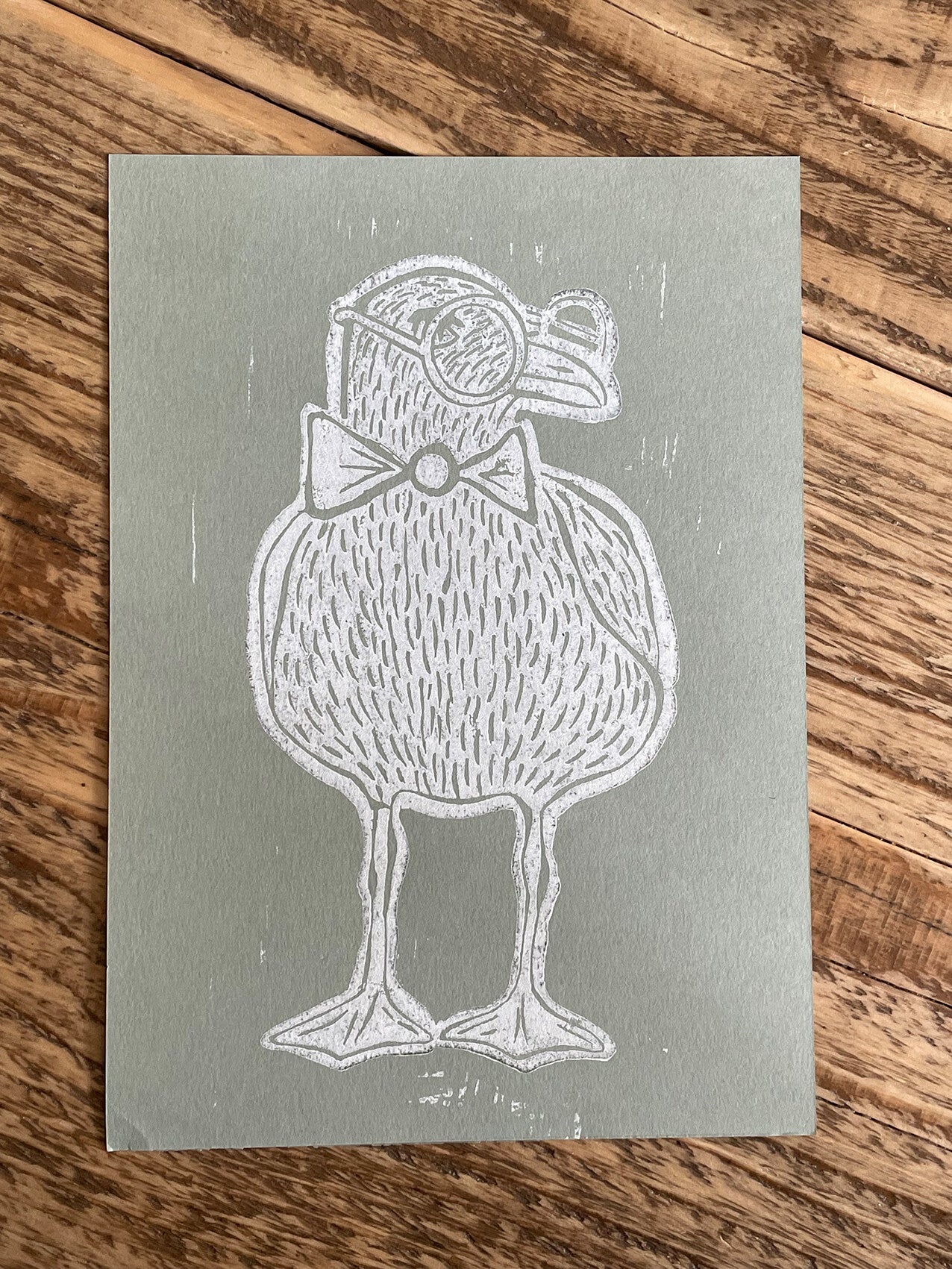 Original Linoldruck Weiße Möwe auf Greygreen