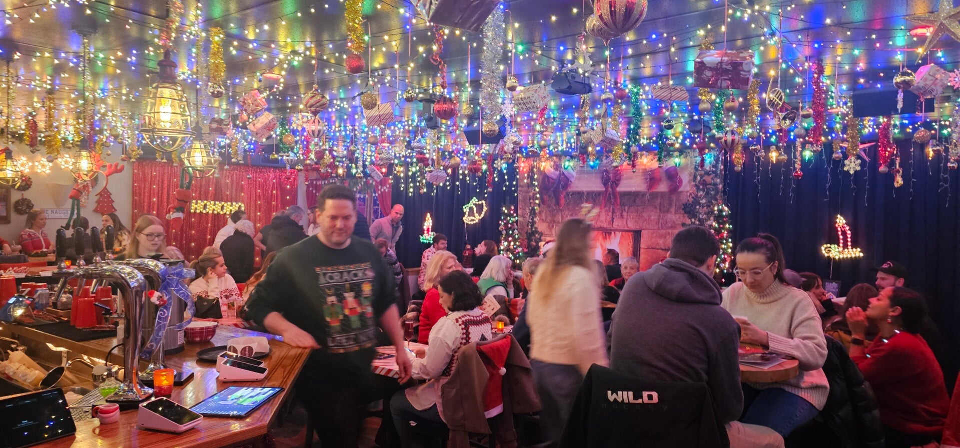 Crowd laughing at a comedy show