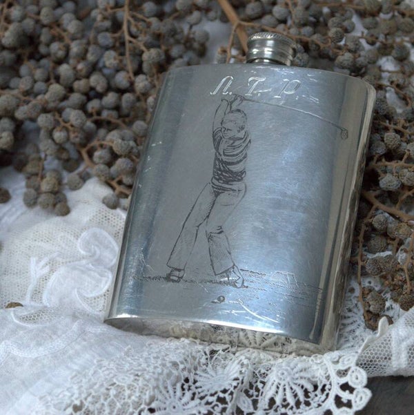 Vintage heupflacon met afbeelding golfer