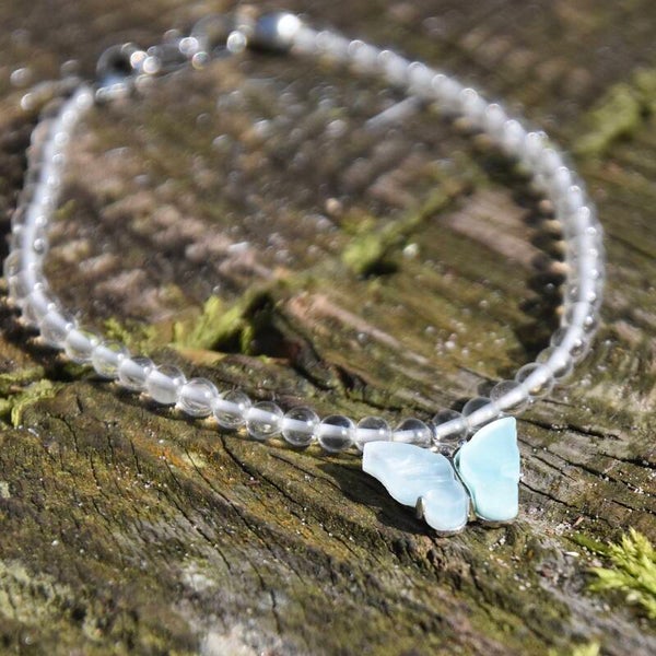 Bergkristal kralenarmband met vlinder