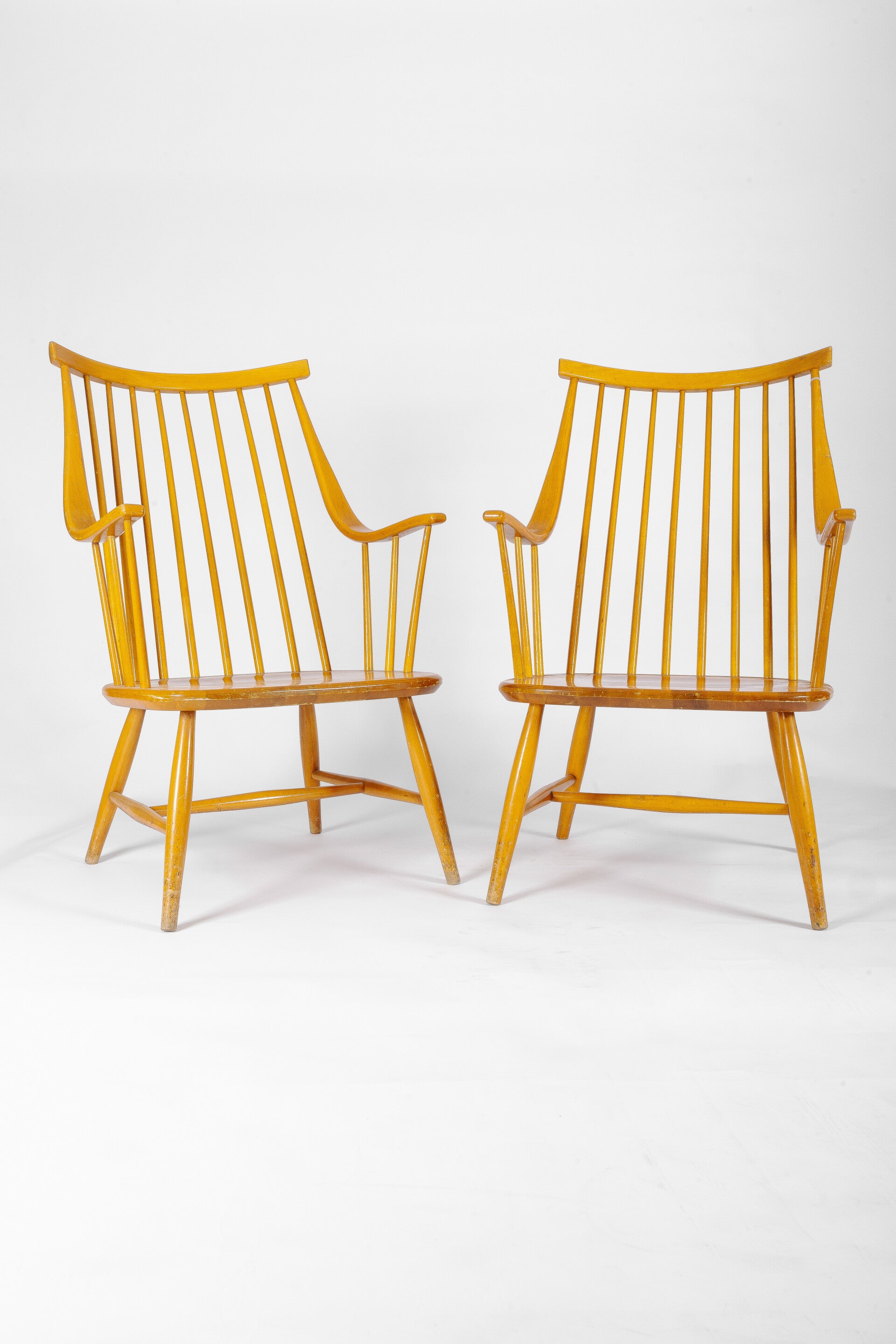 A pair of Lena Larsson Grandessa swedish spindle back chairs by Nesto