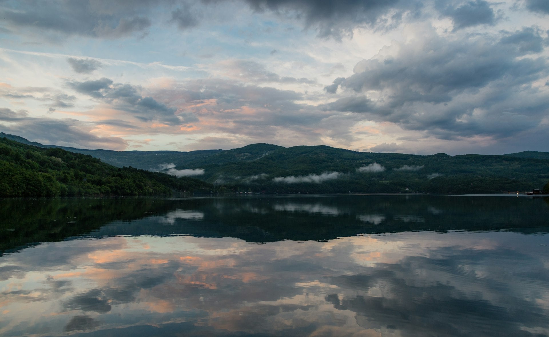 A beautiful view of mountains and the clouds in the sky