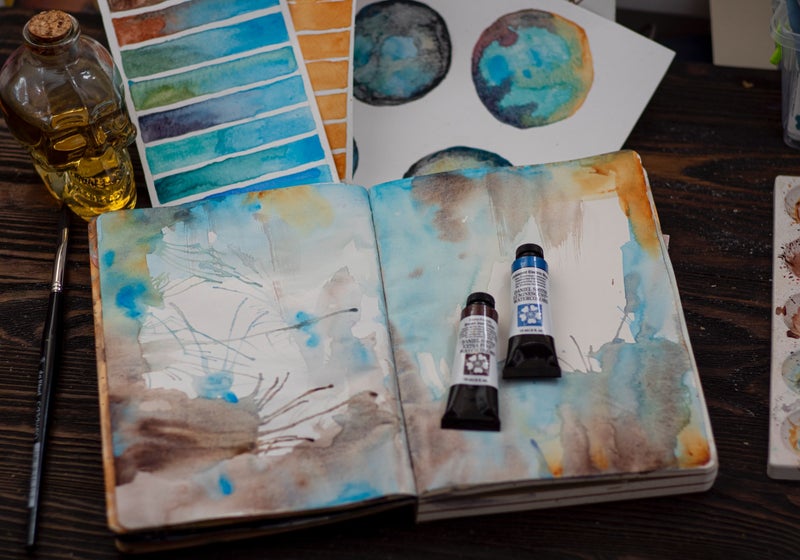 photo journal artiste aquarelle tubes couleurs atelier creatif